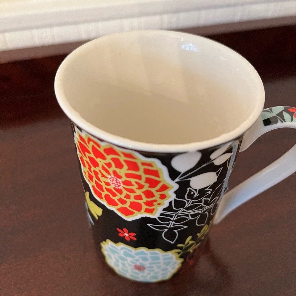 Elegant Floral Mug with Black and Multicolor Design